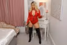 Imogen B in Imogen B Red Bodysuit With Black OTK Boots Demands Total Subservience - 8K VR, photo 1 of 4