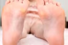 Jerking Off All Over Her Feet, photo 4 of 4